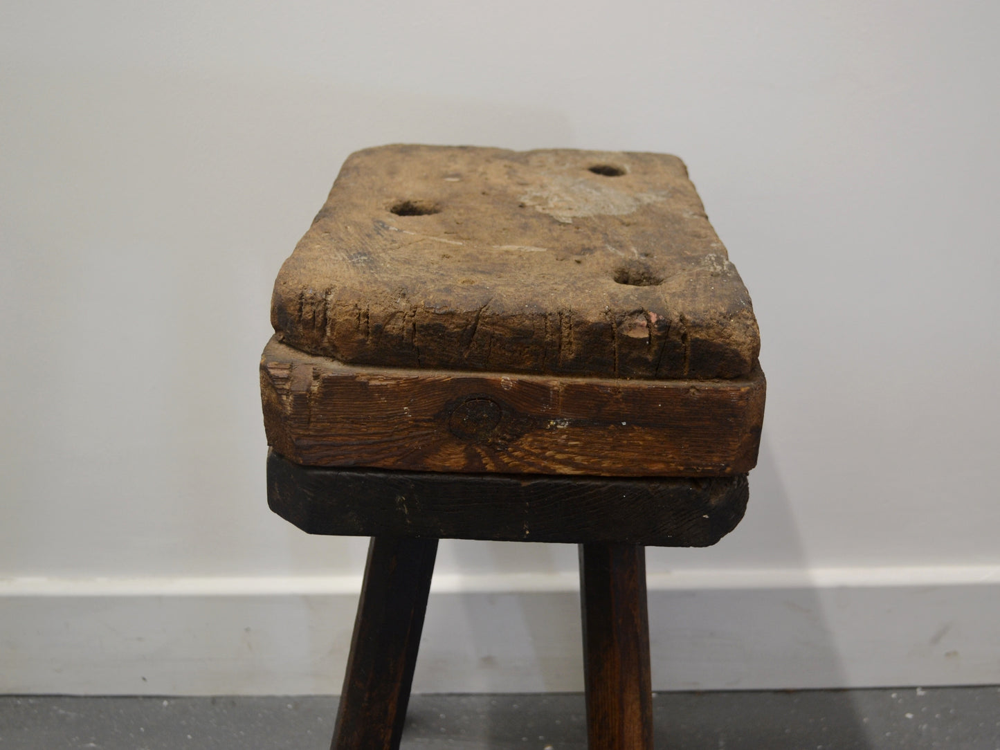 ntique cutler's stool rear view showing four-leg joinery and patina, Victorian England circa 1880s, vernacular folk furniture