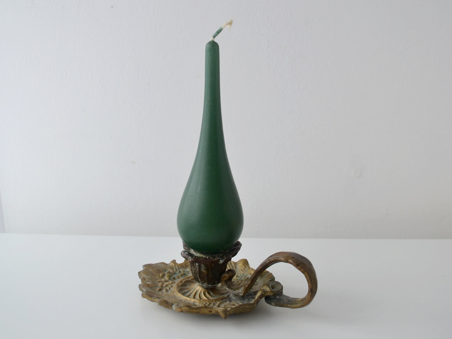 Cast brass and bronze Art Nouveau chamberstick shown with taper candle for scale, European circa 1900. Candle not included.
