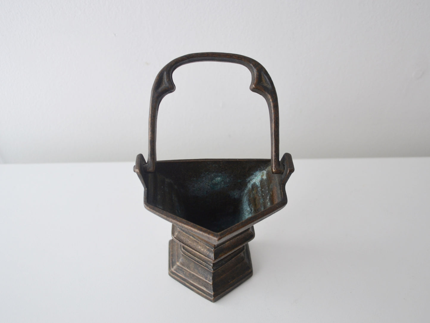 Trefoil arch handle detail of cast bronze Gothic Revival holy water stoup, European circa 1900, natural dark bronze patina