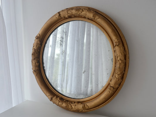 Antique Victorian round gesso barbola wall mirror gilt frame England circa 1880, foxed glass, front view