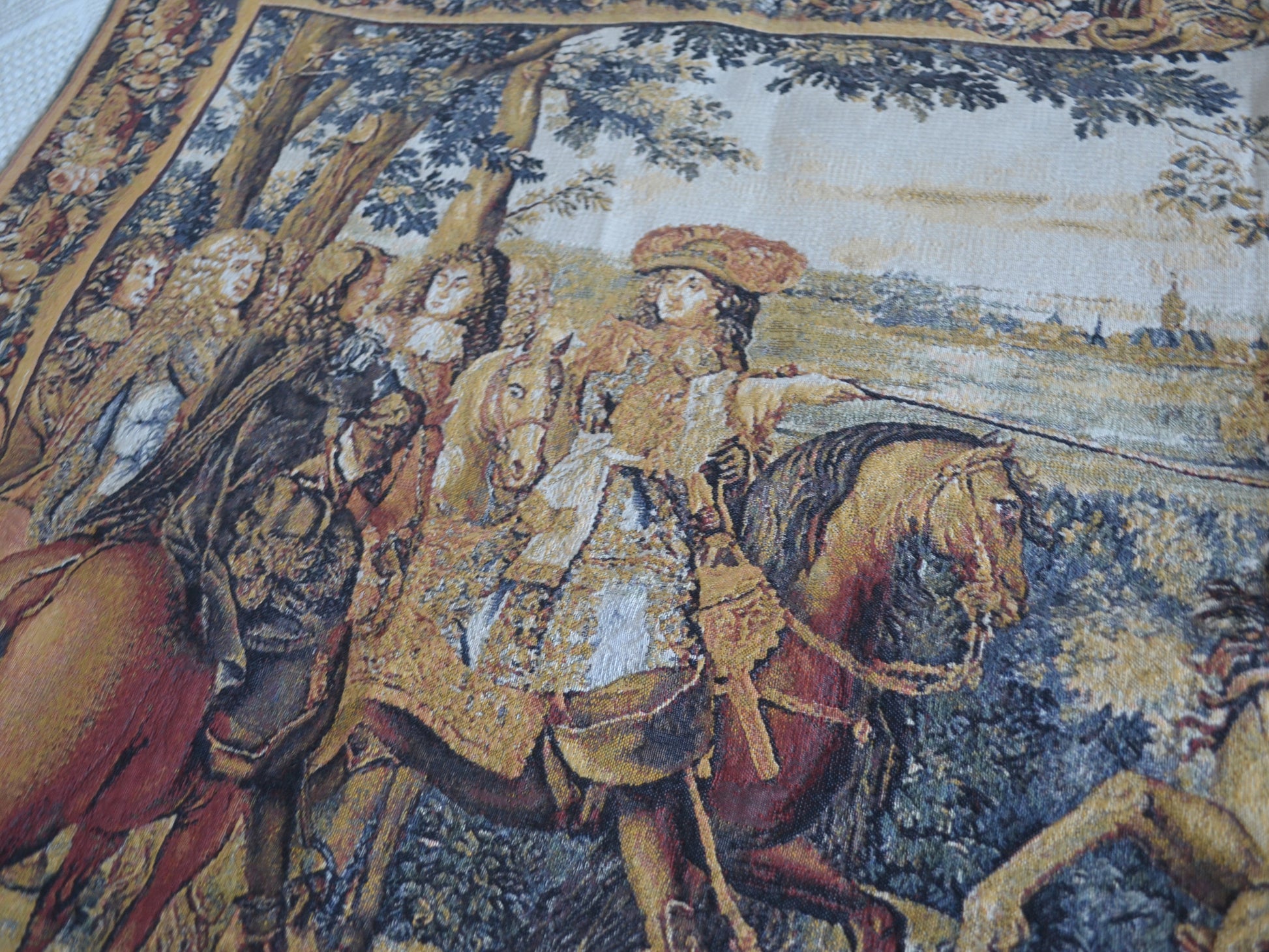 Close-up detail of Louis XIV on horseback, Belgian Flemish Baroque tapestry, Flanders Tapestries, woven textile.