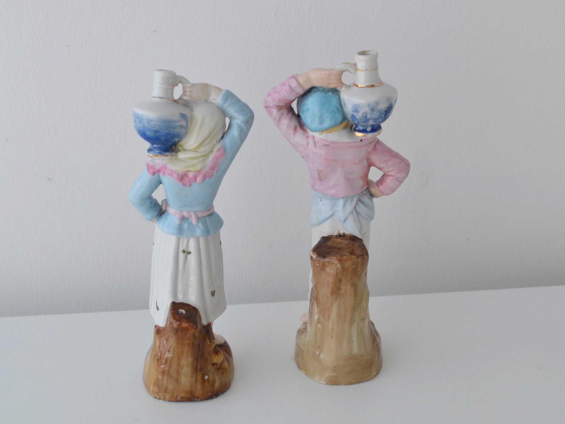 Reverse view of matched Bohemian porcelain figurine pair, Elbogen circa 1880s, naturalistic rocky bases
