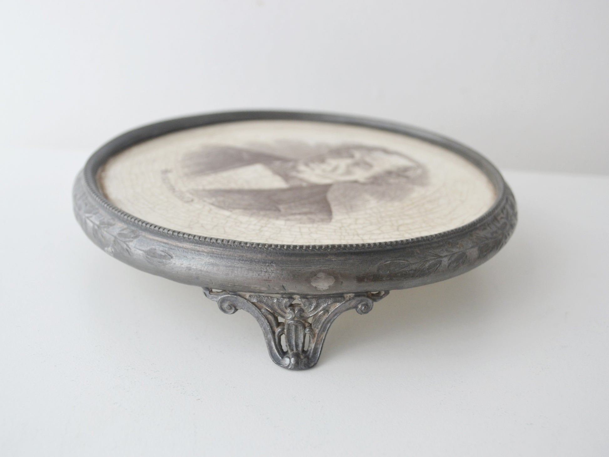 Black transfer-printed portrait of Benjamin Disraeli Earl of Beaconsfield inscribed Beaconsfield, earthenware plaque with period crazing, circa 1881–1885