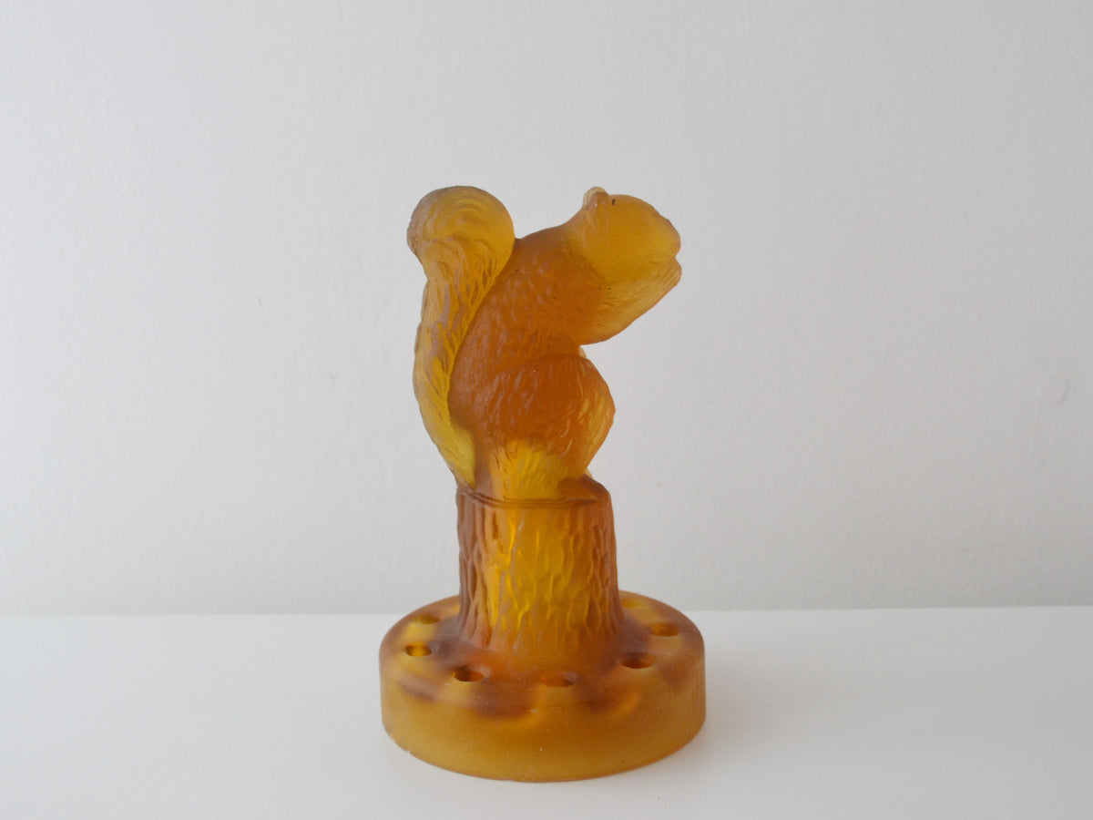 Sowerby Art Deco amber glass squirrel flower frog, front view