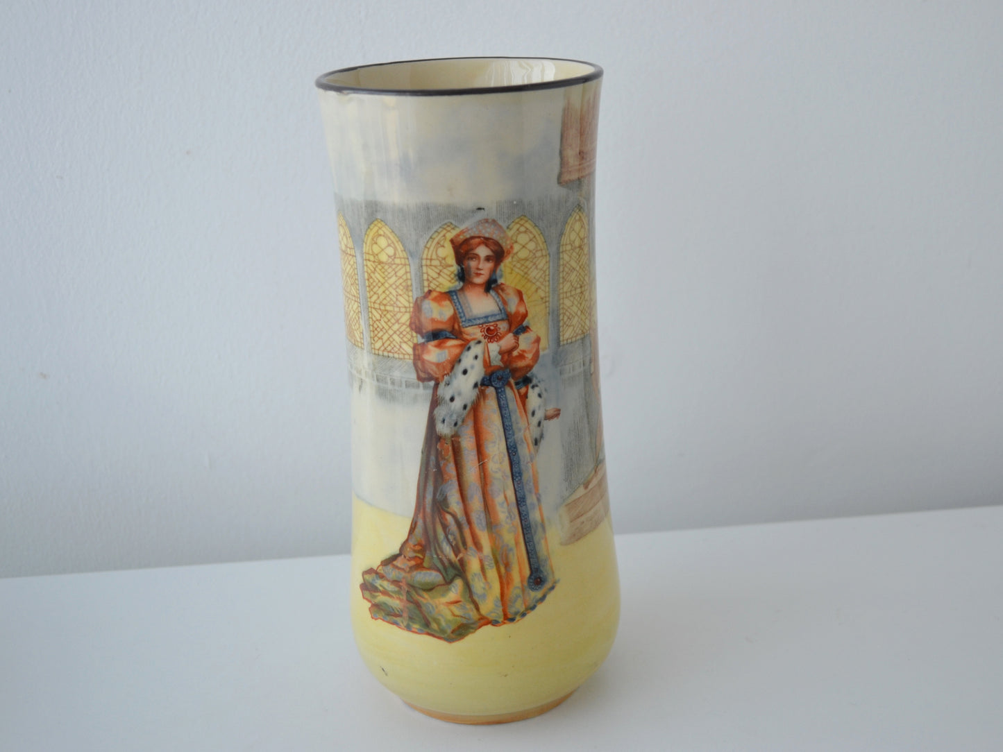 Royal Doulton Shakespeare Series Ware vase Katharine, ochre ground, Gothic interior, England circa 1914, front view.