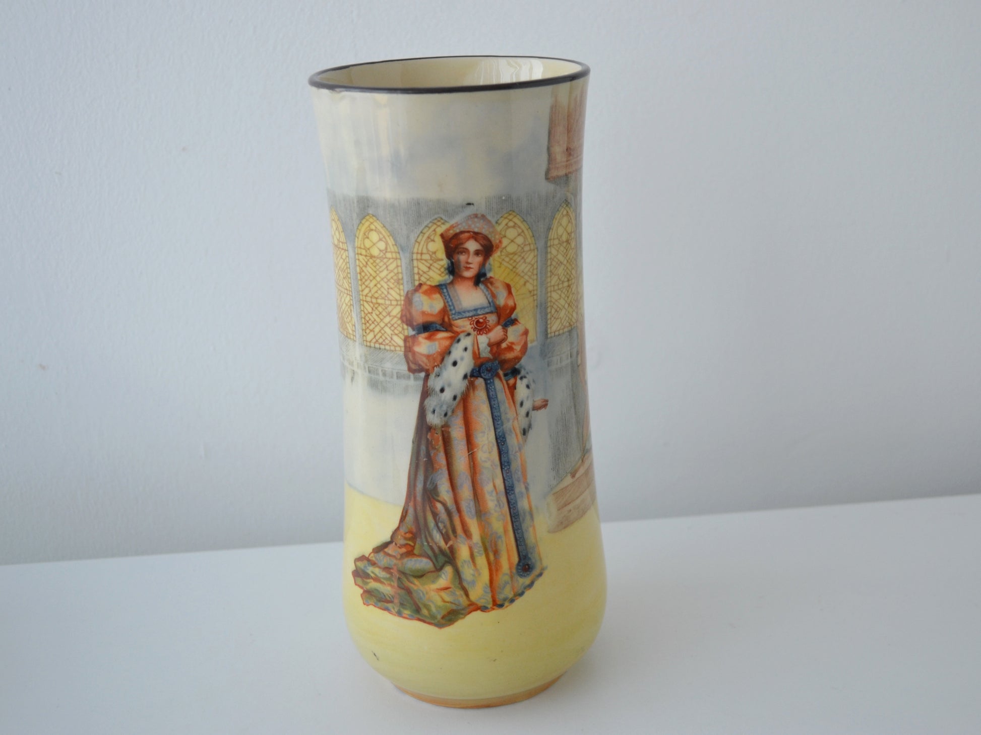 Royal Doulton Shakespeare Series Ware vase Katharine, ochre ground, Gothic interior, England circa 1914, front view.