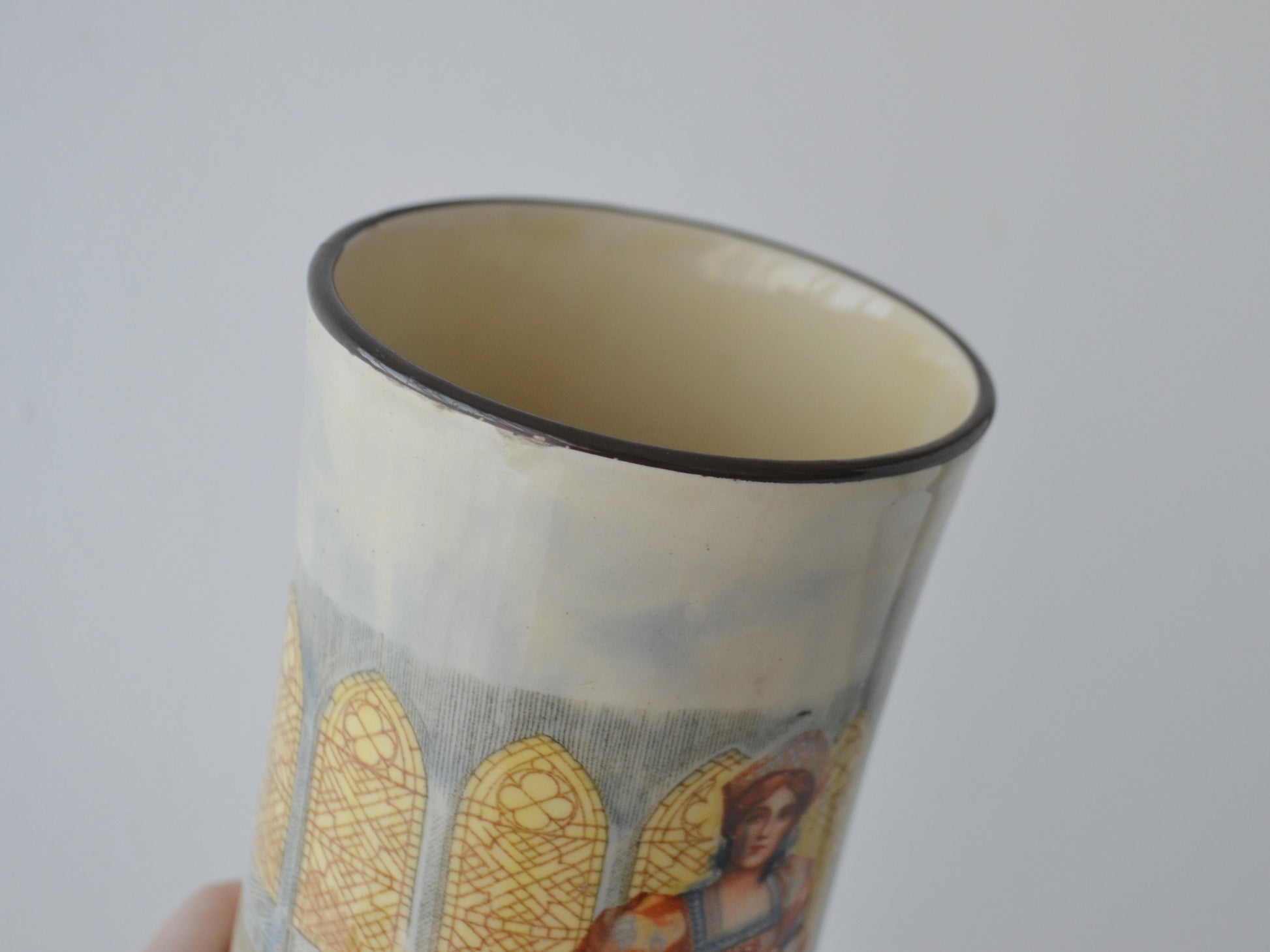 Rim detail, Royal Doulton Shakespeare Series Ware vase Katharine, characteristic dark manufacturing finish, circa 1914.