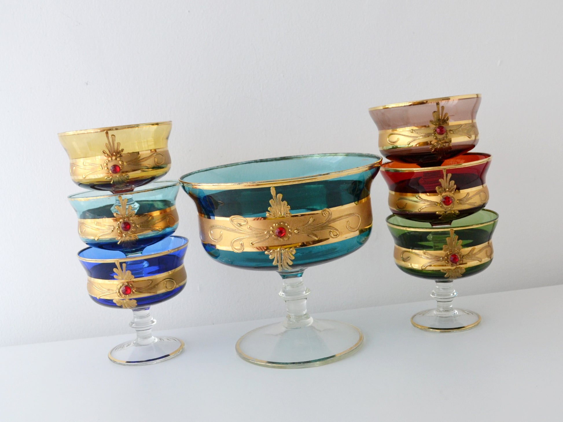 Applied gold band with ruby cabochon on Venetian Murano style glass coupe, circa 1950s.
