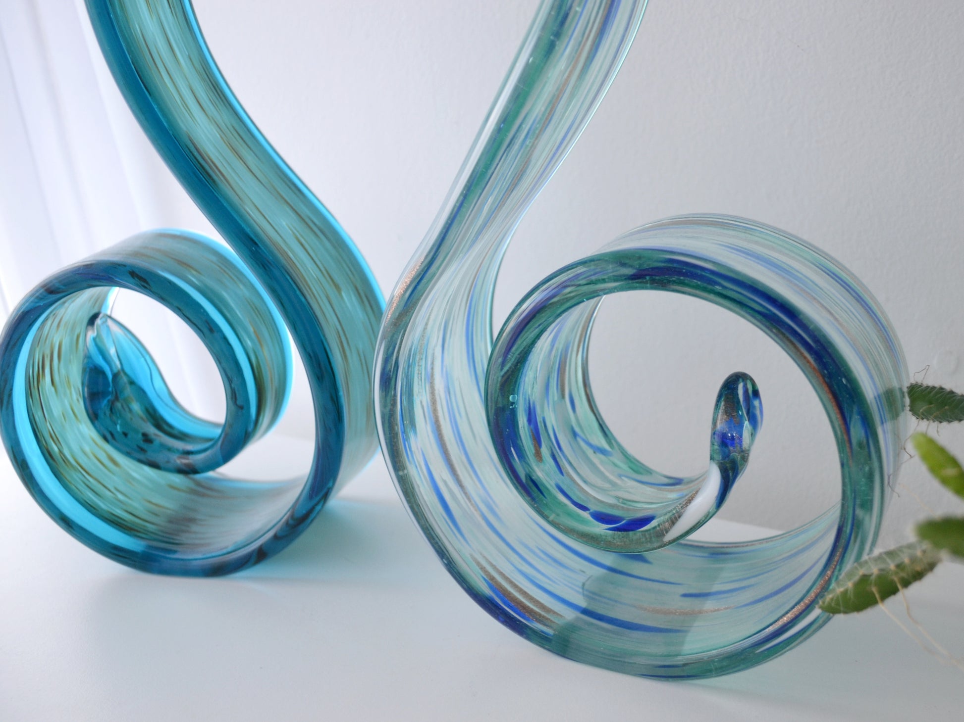 Coiled spiral base detail of hand-blown aqua glass swirl sculpture, Italian Murano style, circa 1990s.