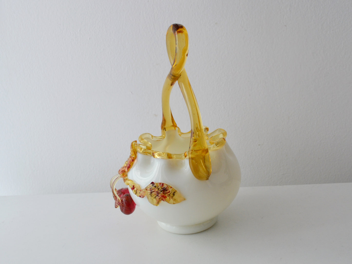 Looped amber glass handle detail, Victorian art glass basket, hand-applied decoration, circa 1880–1900