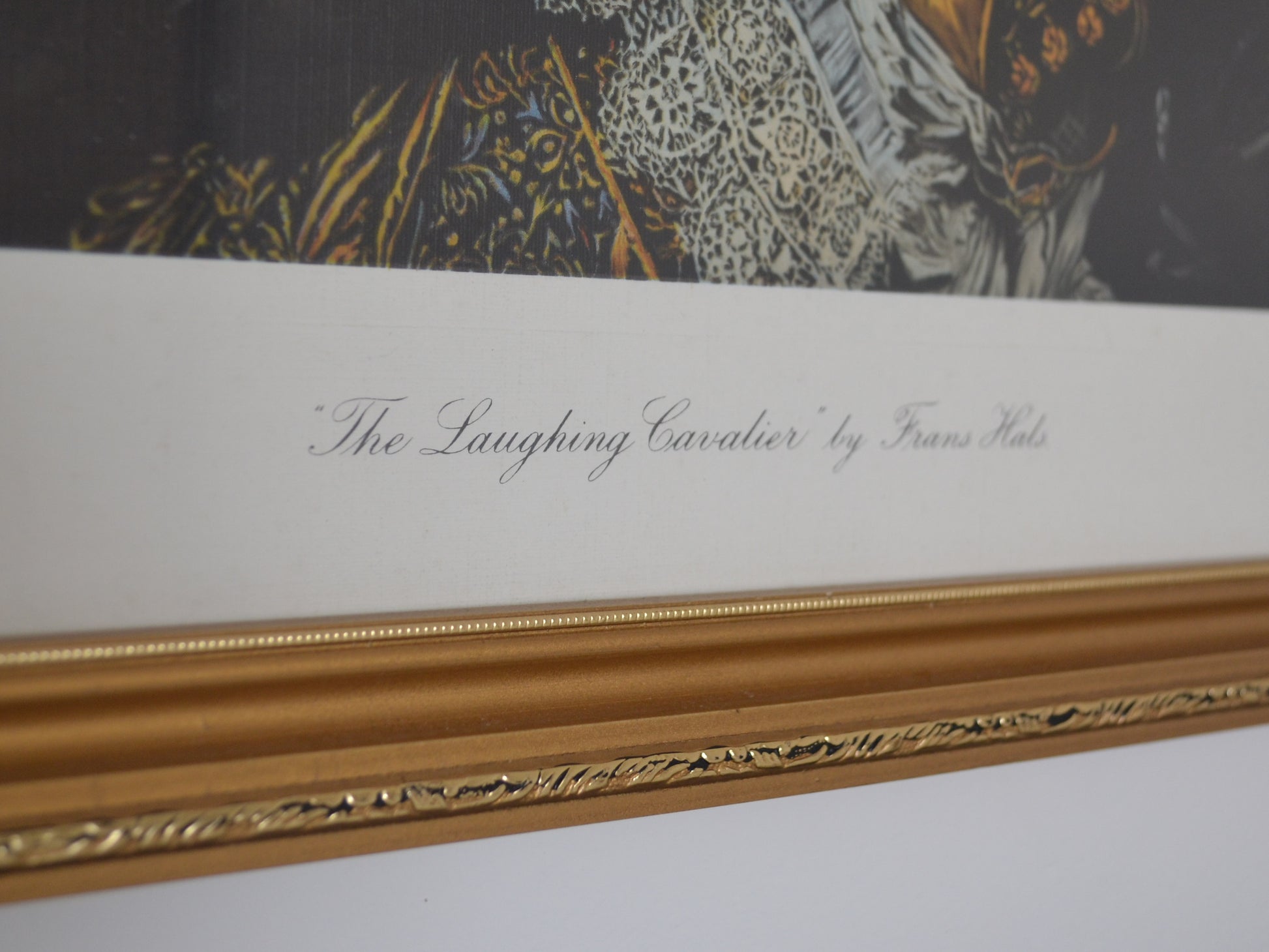 Gilt wood frame detail, The Laughing Cavalier chromolithograph print, England 1932, corner ornament.