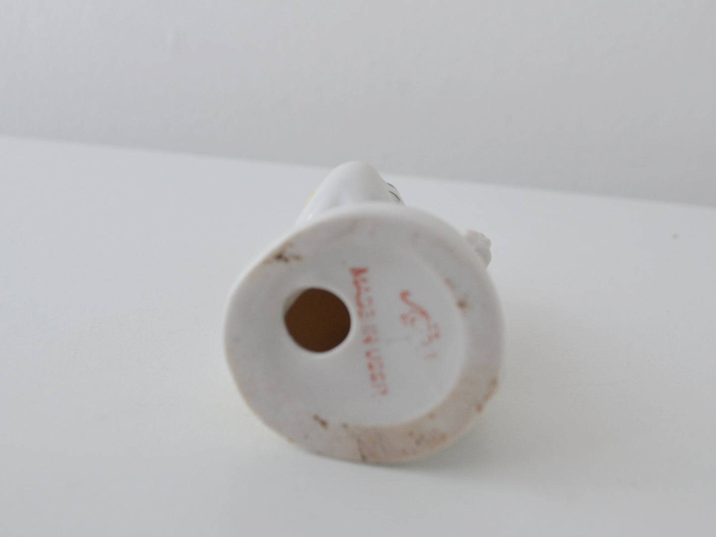 Red underglaze LFZ maker's mark on base of Soviet porcelain figurine, circa 1960s.