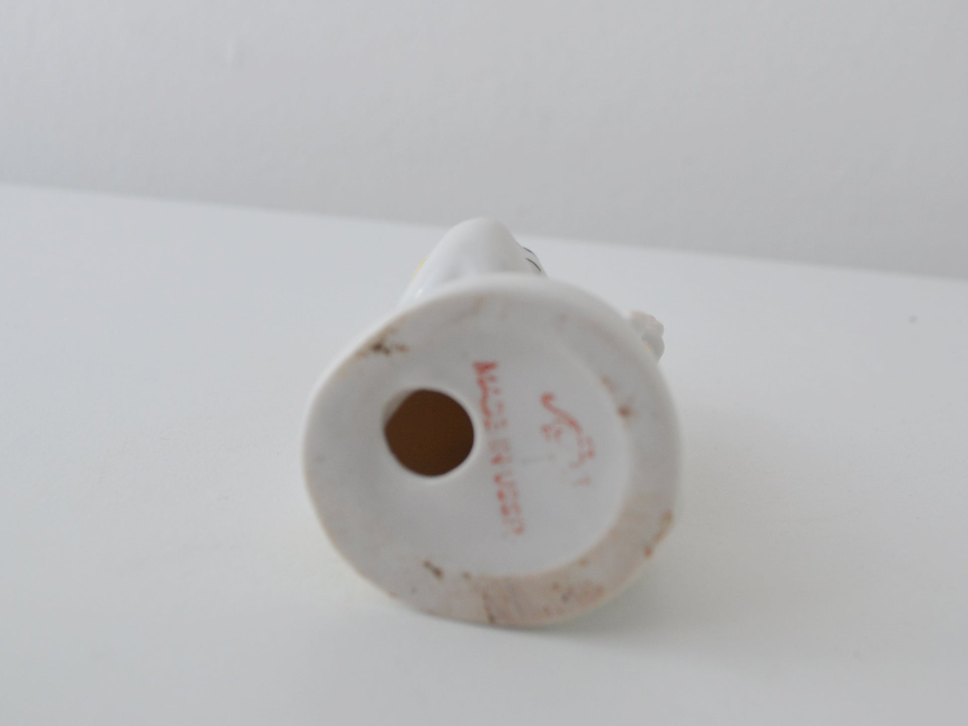 Red underglaze LFZ maker's mark on base of Soviet porcelain figurine, circa 1960s.