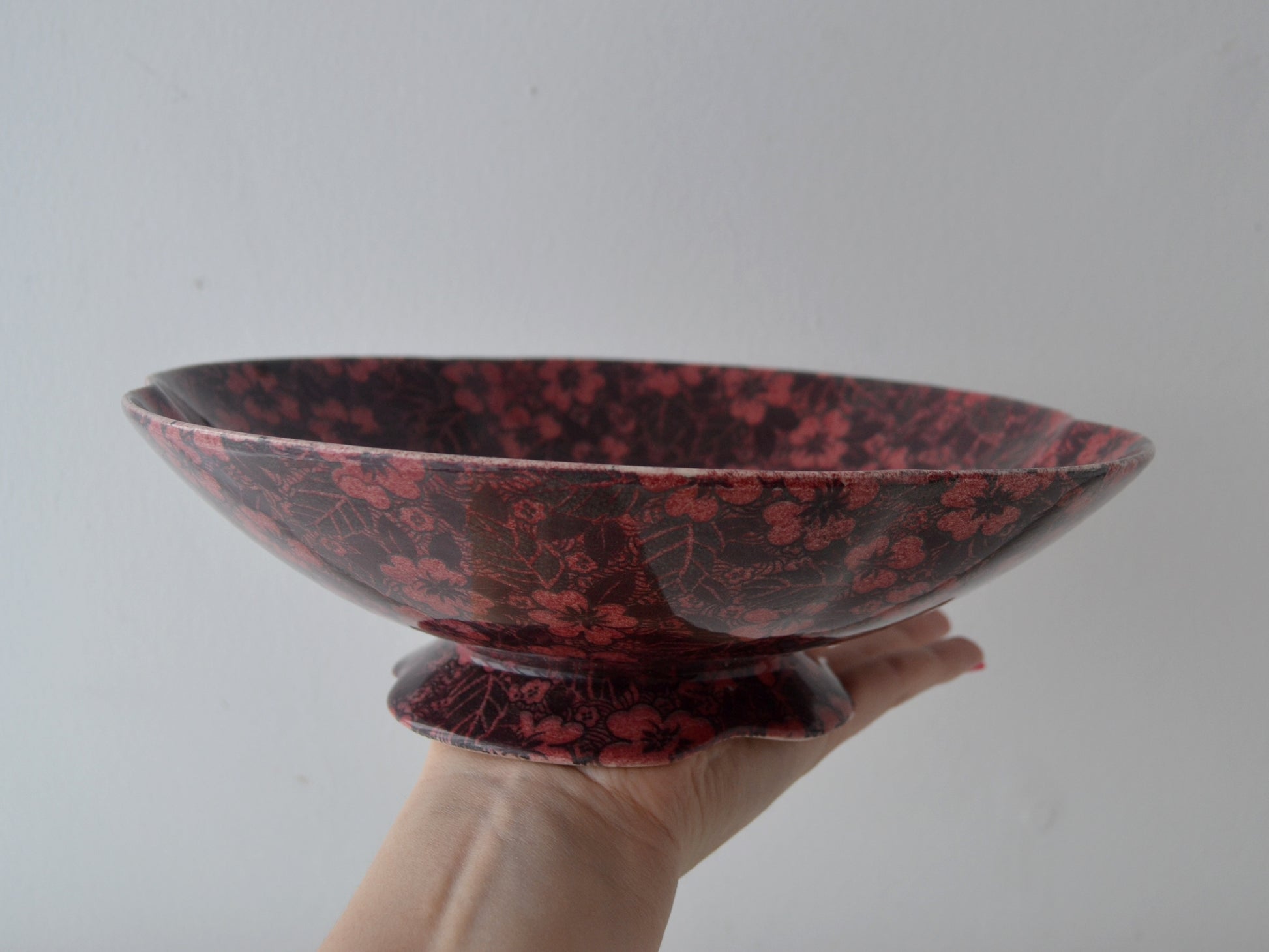 Royal Winton Grimwades chintz scalloped footed bowl, rare dark burgundy floral pattern, England circa 1930s, side view