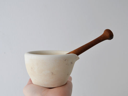 Wedgwood composition mortar and pestle, stamped Size 1, England circa 1900, ivory ceramic mortar with turned wooden pestle, front view