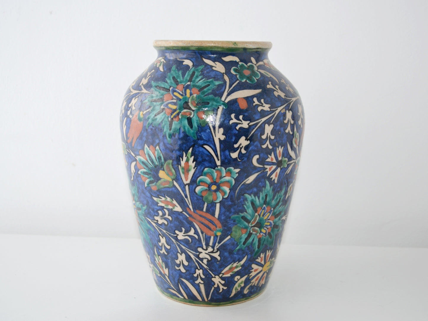 Armenian Jerusalem pottery vase, cobalt blue ground with teal and terracotta Iznik flowers, side view, circa 1930s