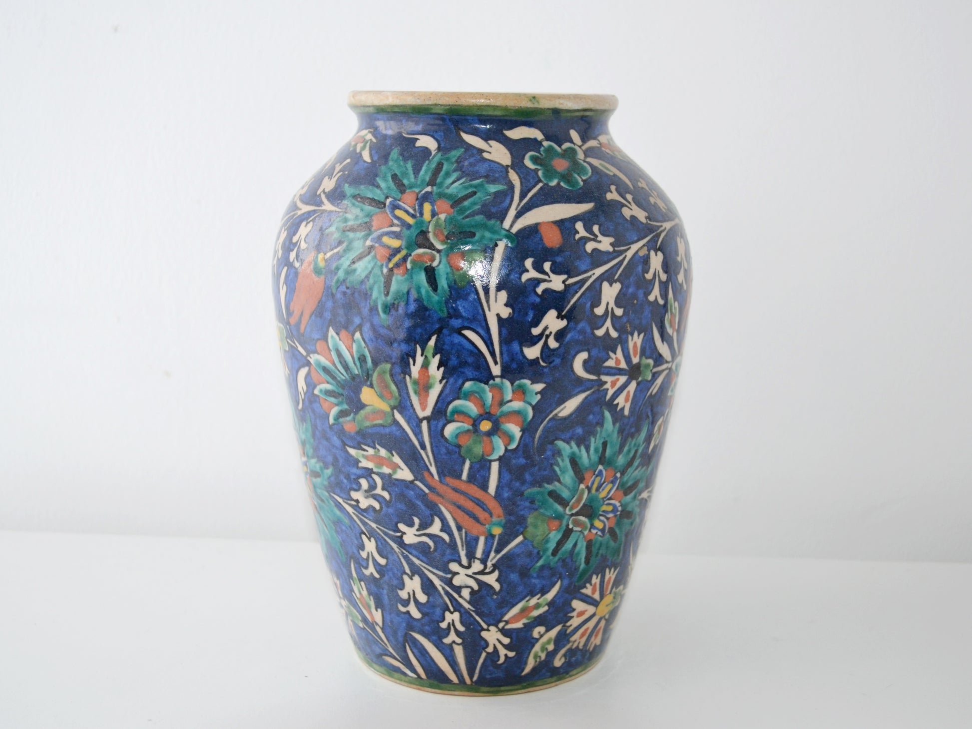 Armenian Jerusalem pottery vase, cobalt blue ground with teal and terracotta Iznik flowers, side view, circa 1930s