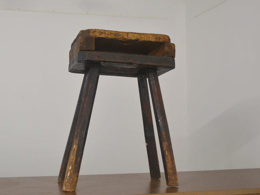 Antique cutler's stool four legs, solid wood, deep dark patina, Victorian England circa 1880s, front three-quarter view